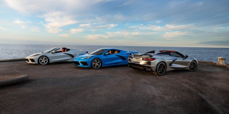Three Corvettes parked by the seaside