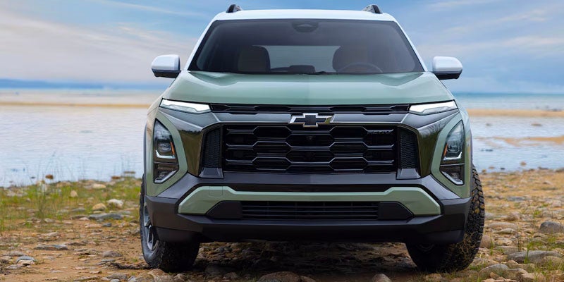 Chevy car parked by the lakeside